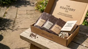 Close-up of premium, freshly roasted whole coffee beans with tasting notes on the packaging.