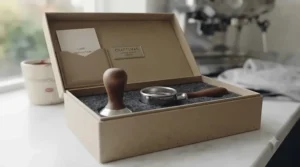 A wooden espresso tamper presented in sustainable, eco-friendly packaging.