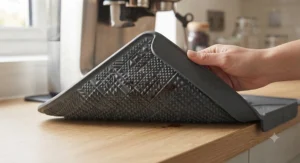 A bottom-up view of an anti-slip tamping mat showing the grip texture that stays stable on kitchen surfaces.