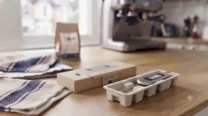 Minimalist, plastic-free packaging alongside a new digital coffee thermometer ready for a British kitchen setup.