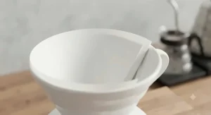Technical diagram showing the 60-degree conical angle of a V60 filter paper designed for optimal water flow.